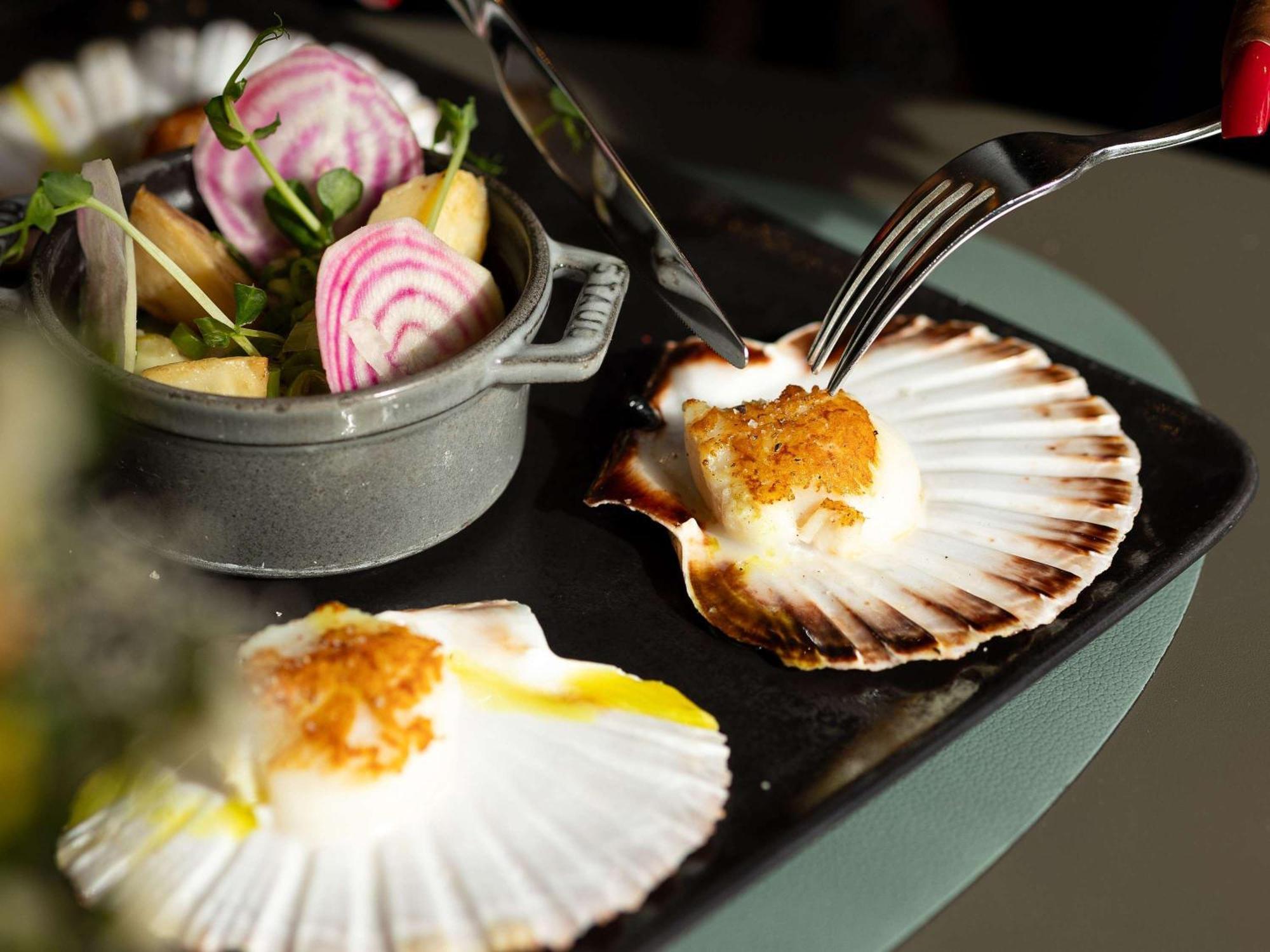 铂尔曼巴黎德芬斯度假酒店 库尔布瓦 外观 照片 Scallops